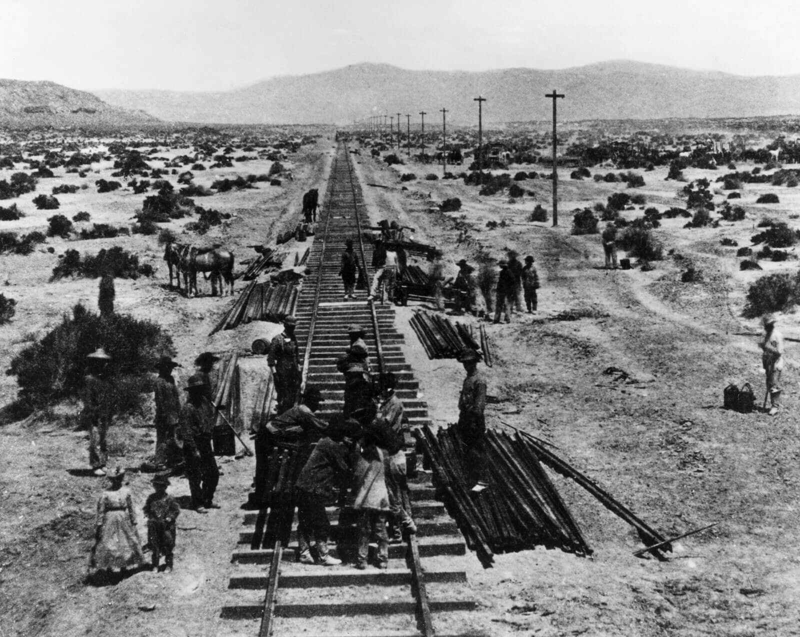 Workers laying tracks for the Central Pacific Railroad in Nevada, 1868.